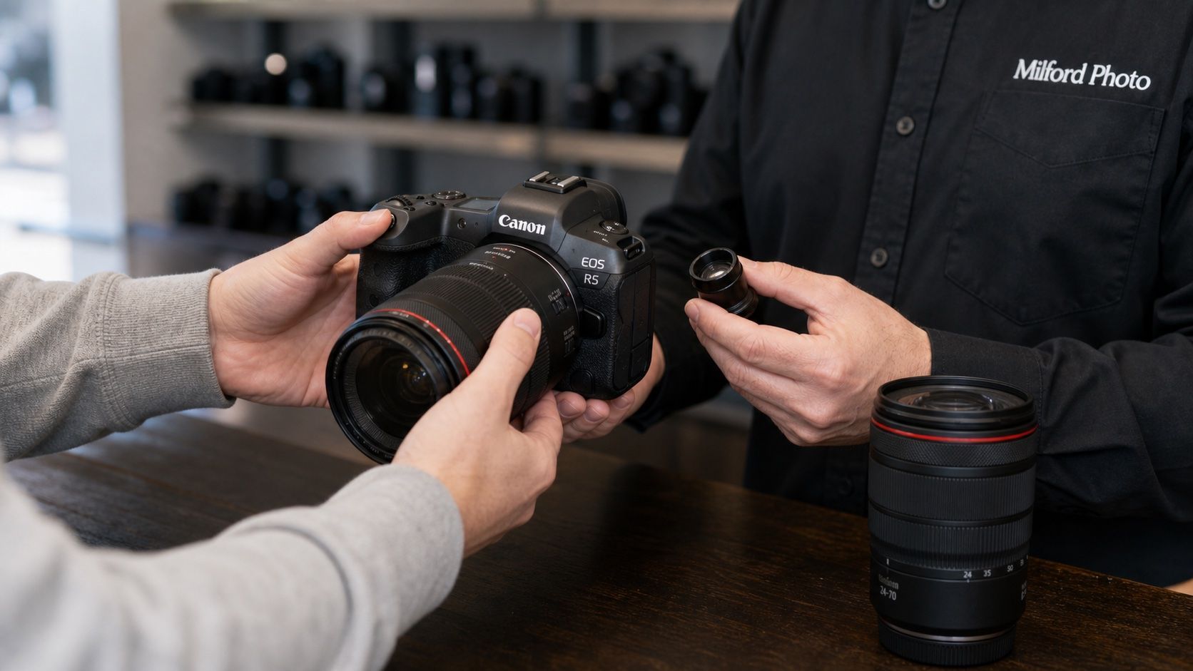 A customer bringing camera gear to Milford Photo for an offer