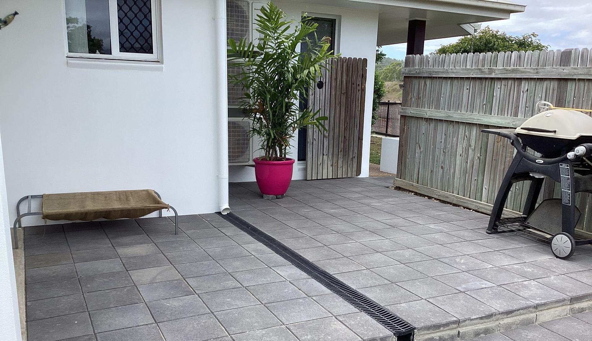 Tiles are installed in the backyard— Handyman Services in Belgian Gardens, QLD