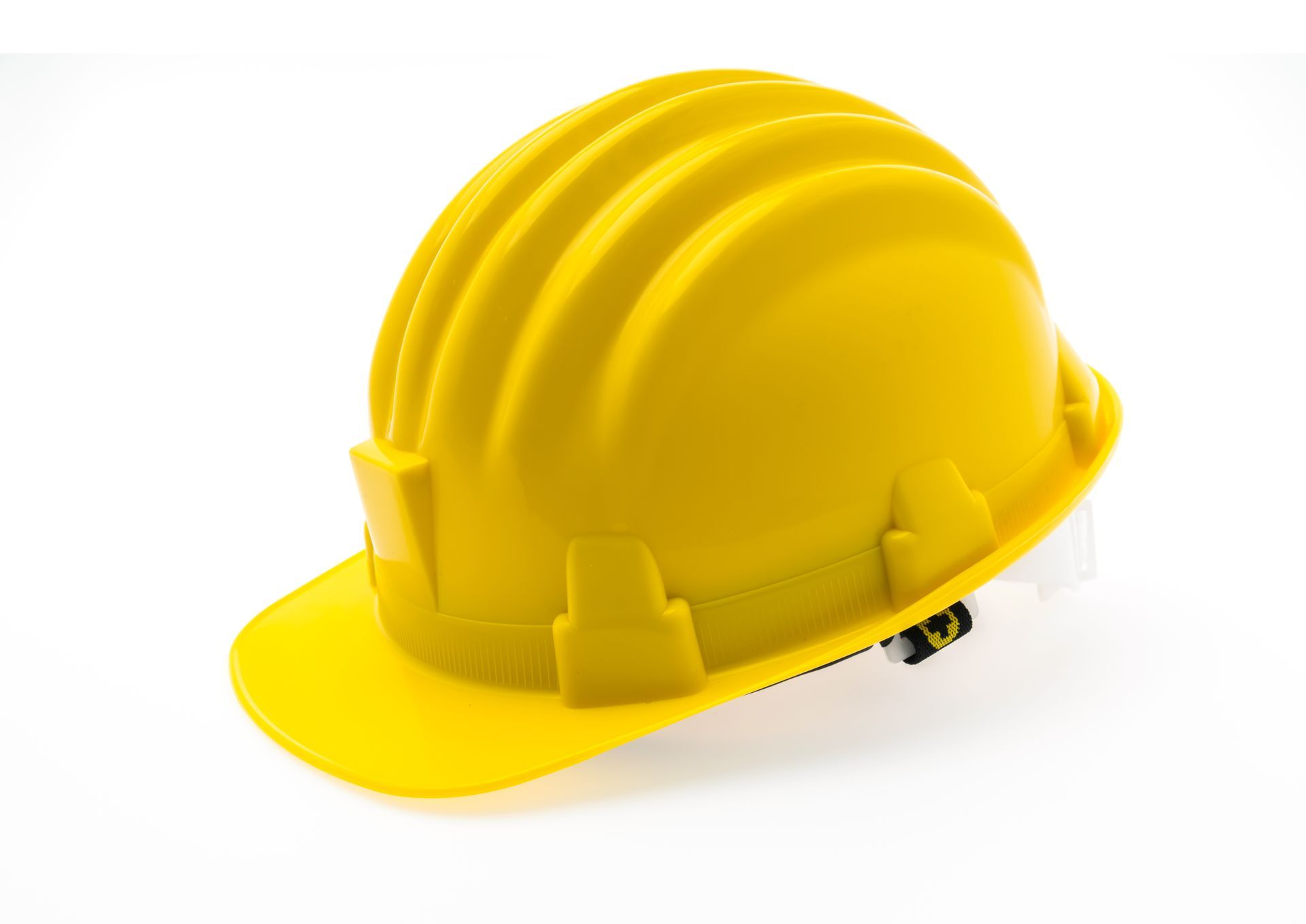 Casco amarillo, probablemente para construcción o seguridad.