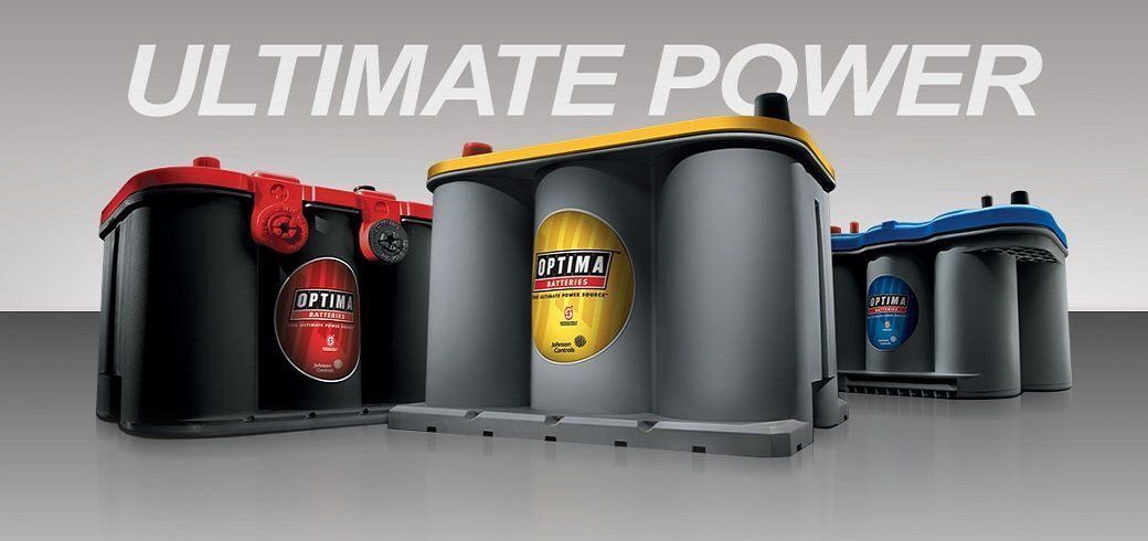 A Group of Batteries Are Sitting Next to Each Other on a Table — Central Coast Batteries In Long Jetty, NSW