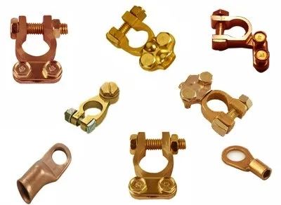 A Bunch of Different Types of Battery Terminals on a White Background — Central Coast Batteries In Long Jetty, NSW