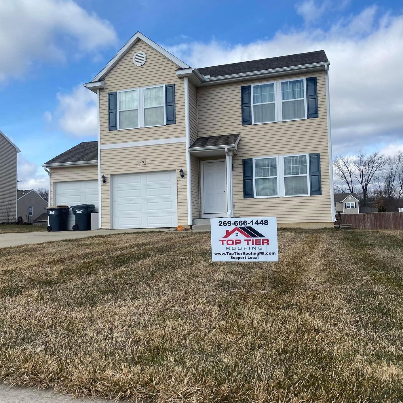 a beautiful home with a new roof installed by Top Tier Roofing