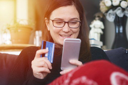 Memberships — Young Woman Buying with Credit Card and Smart Phone  in Union Gap, WA