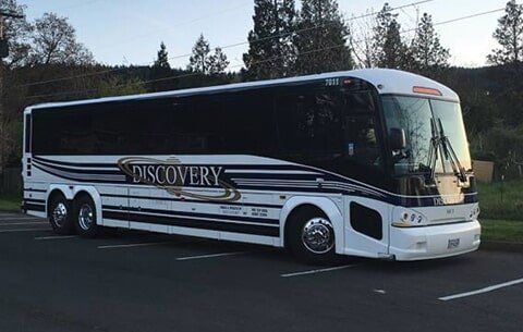 Bus For Hire — Discovery Charter Bus With Tinted Window  in Castroville, CA