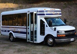 Bus Charter — White Charter Bus  in Castroville, CA