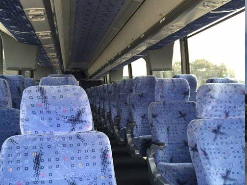 Bus For Wine Tour — Group Of Bus Waiting For The Passengers  in Castroville, CA