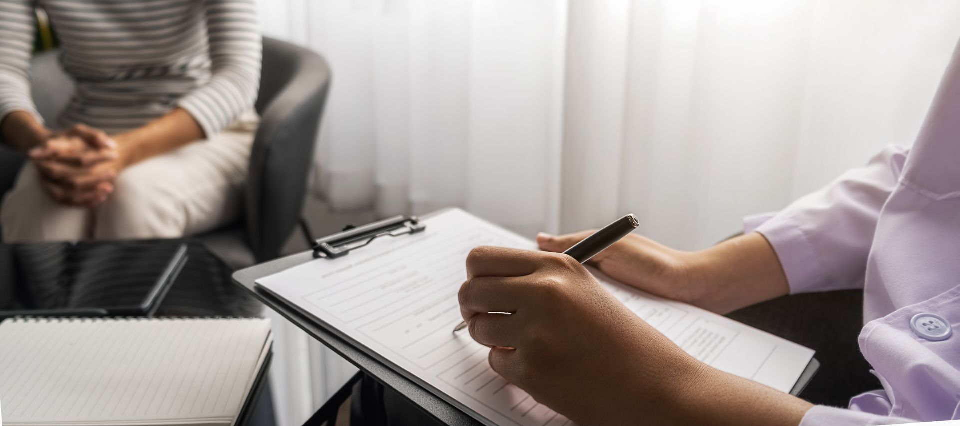 Professional psychologists providing mental health support in a private therapy office. Professional psychologists providing mental health support in a private therapy office.