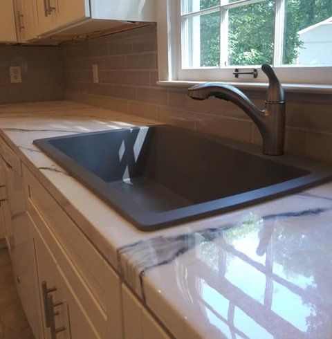 Kitchen Sink with Epoxy Countertop | Holiday, FL | Jason Renovations