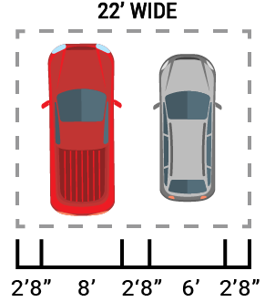 A red truck and a silver car are parked next to each other.