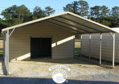 A garage with a canopy and a sign that says handmade home