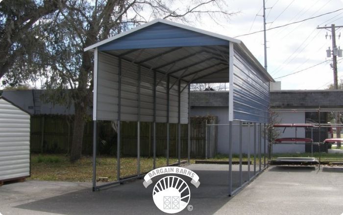 A carport with a blue roof and a white roof