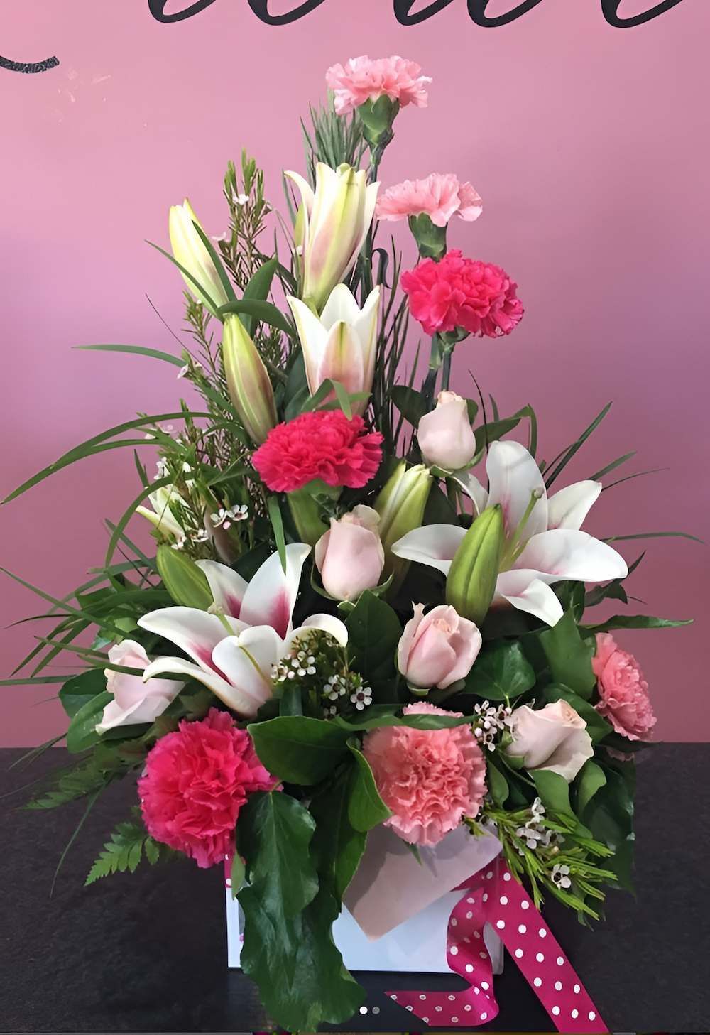 A Bouquet of Pink and White Flowers in a White Box — Bundaberg House of Flowers In Moore Park Beach, QLD