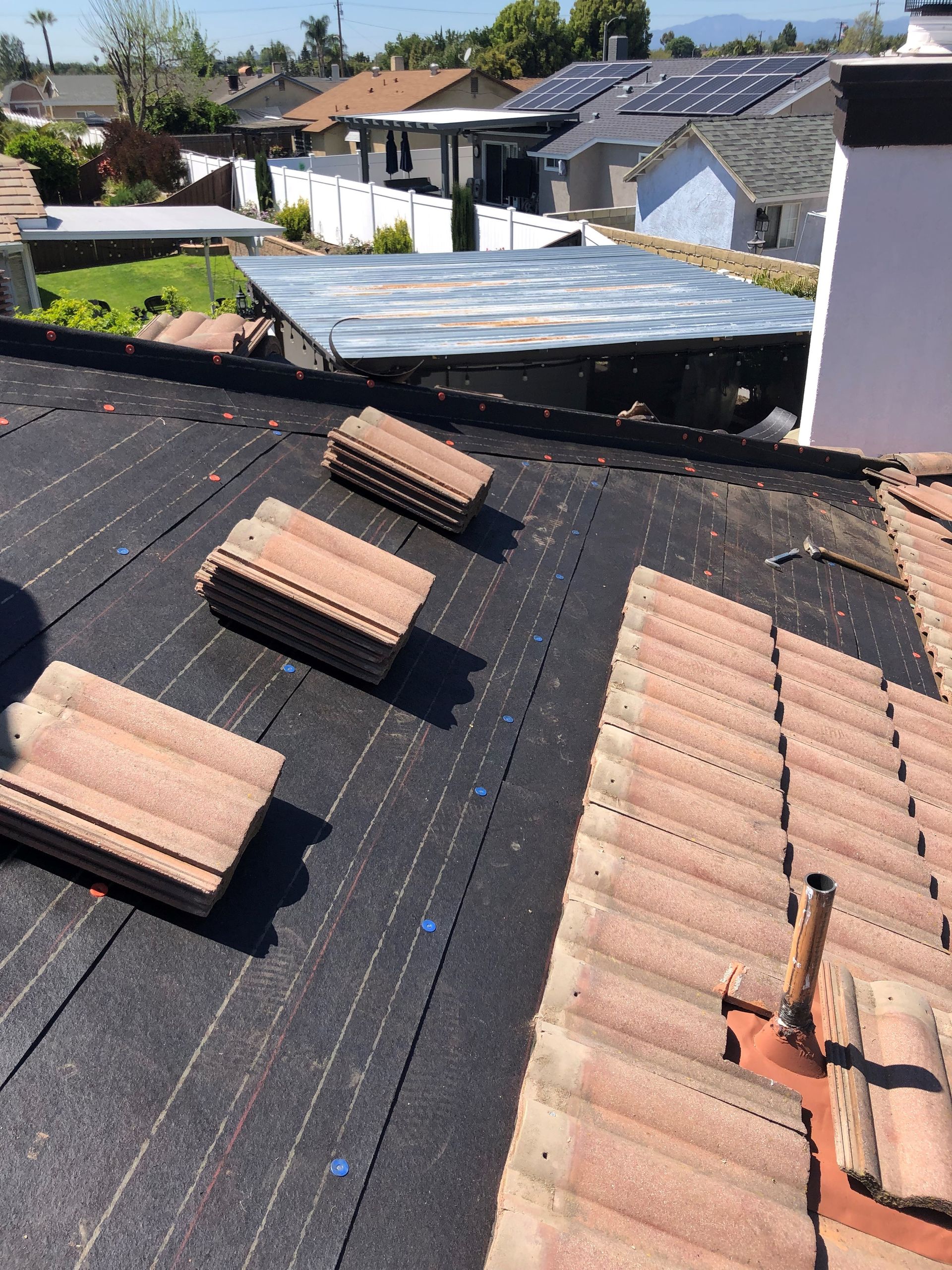 A roof with a tool on top of it.