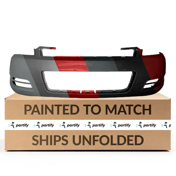 Painted car bumper on a cardboard box, marked