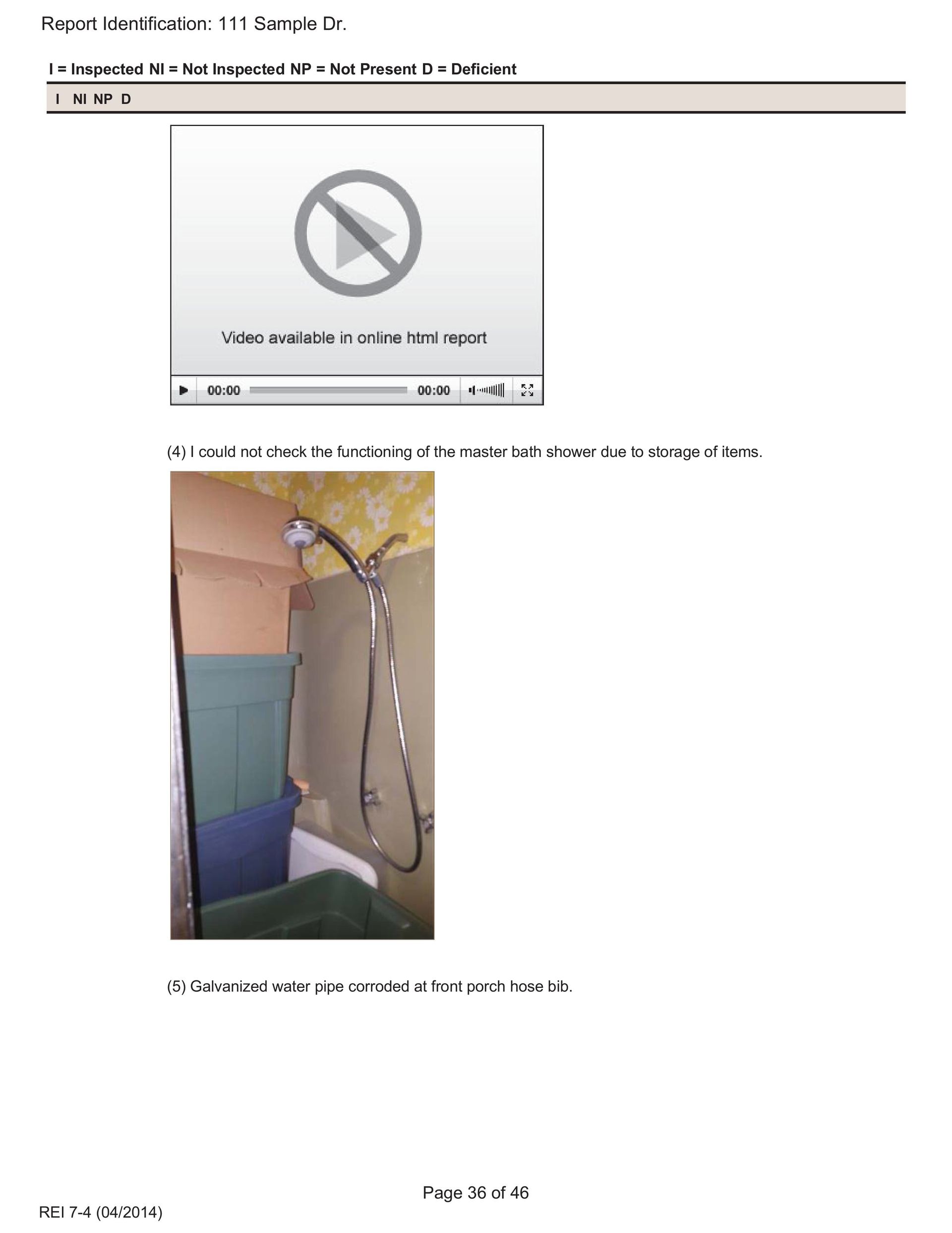 A shower head with a long silver hose mounted in a corner with cardboard boxes stacked nearby.