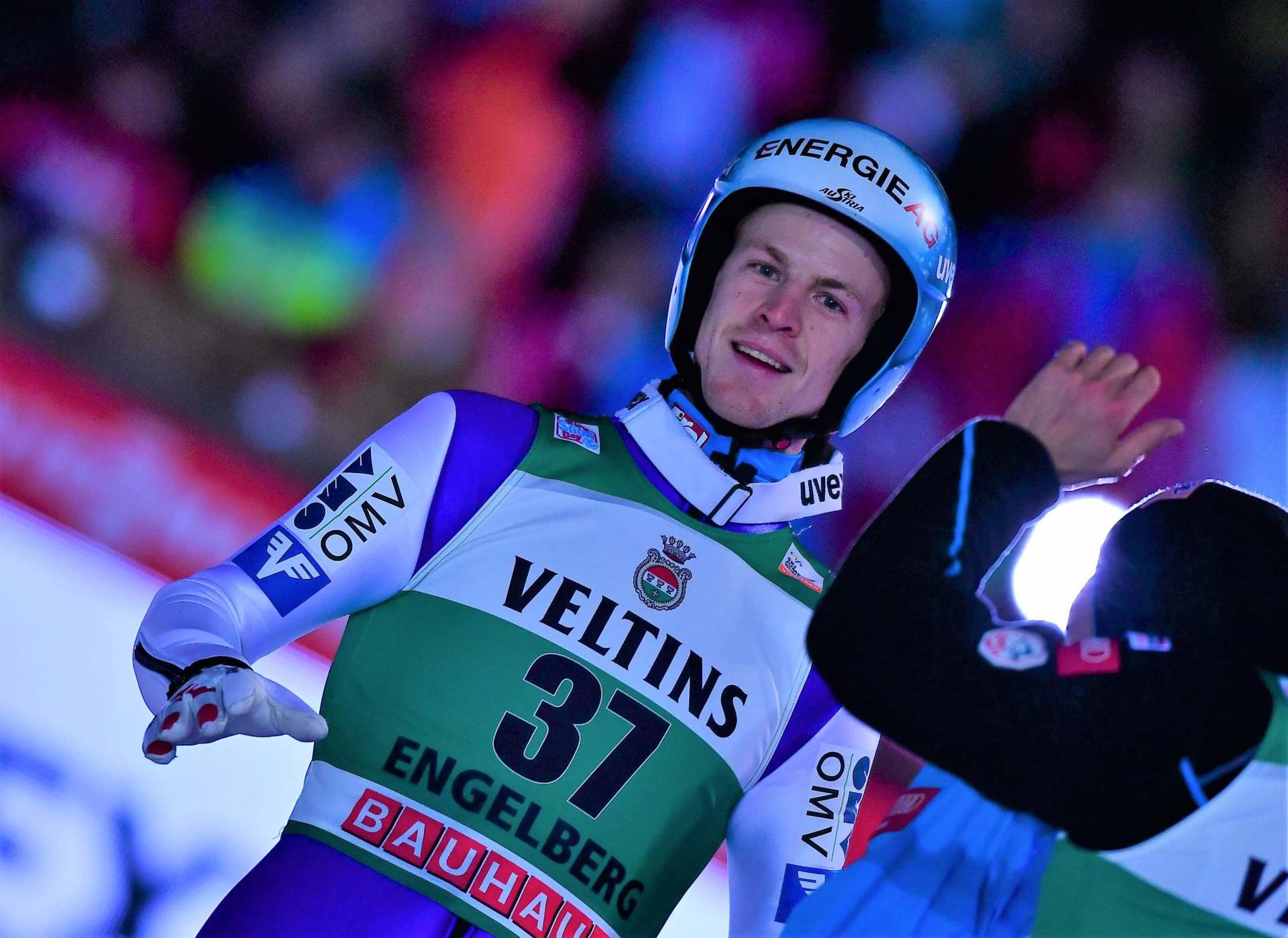 Skispringer nach Sprung im Zielauslauf