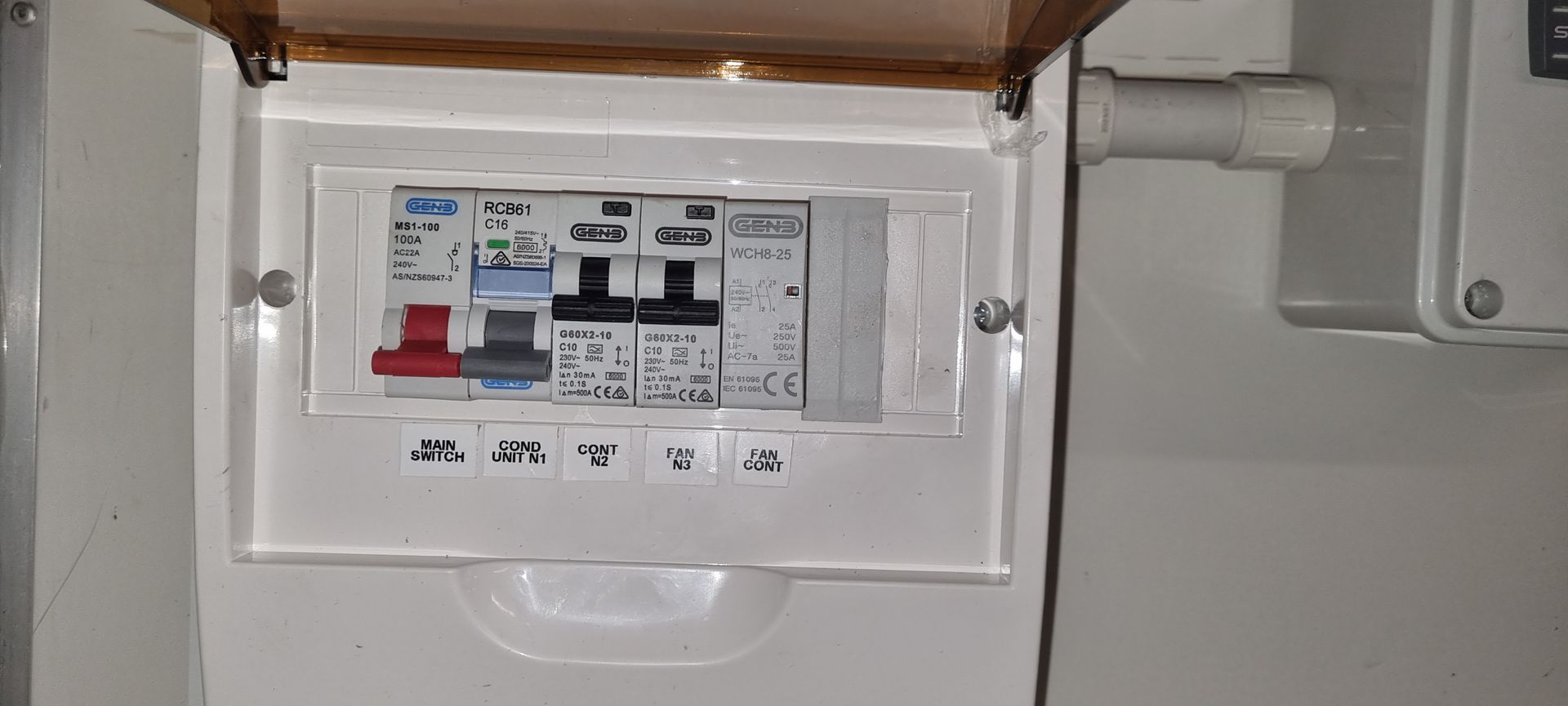 A close up of a electrical box on a wall.