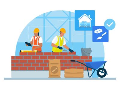Una coppia di operai edili sta costruendo un muro di mattoni.