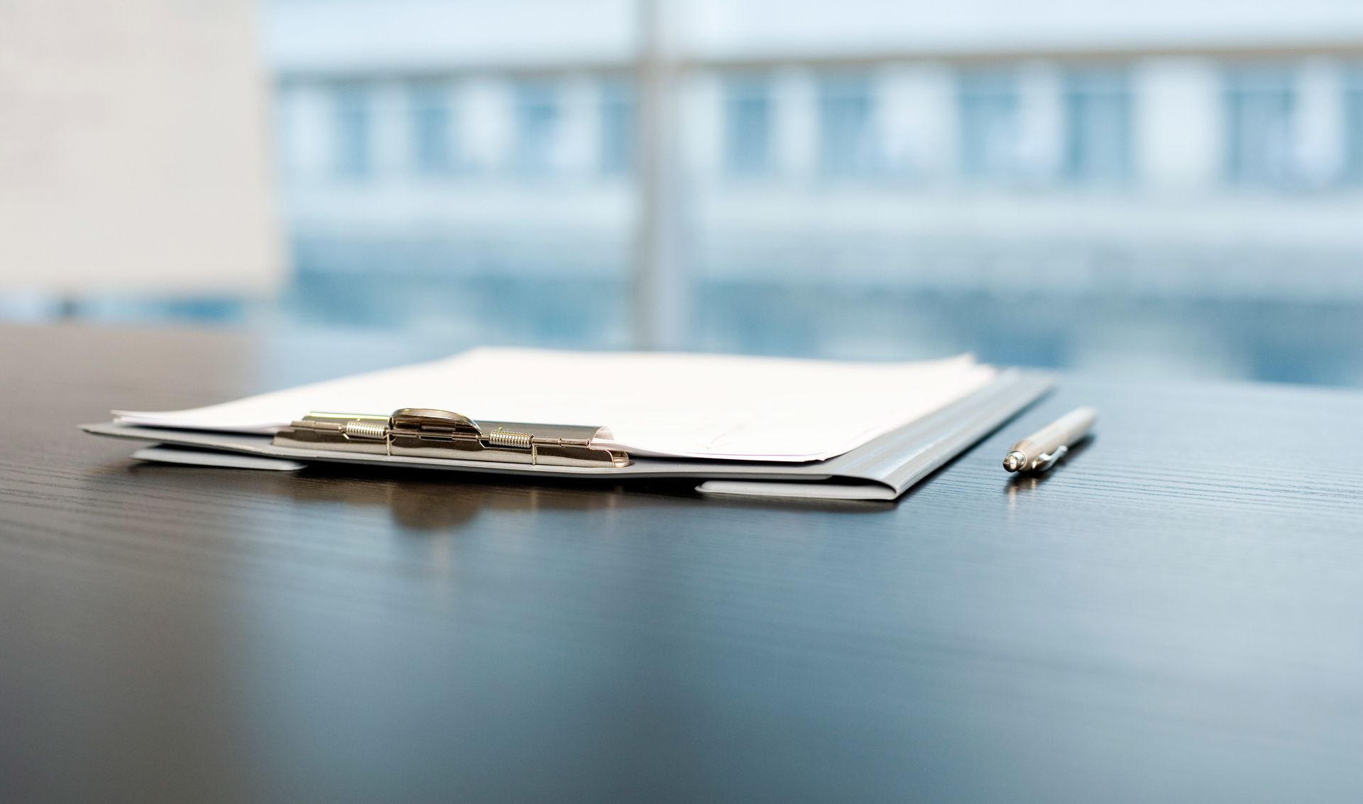 Pen and clipboard in therapist's office