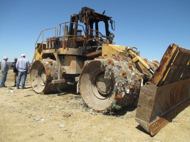 Bulldozer waiting for claims adjuster