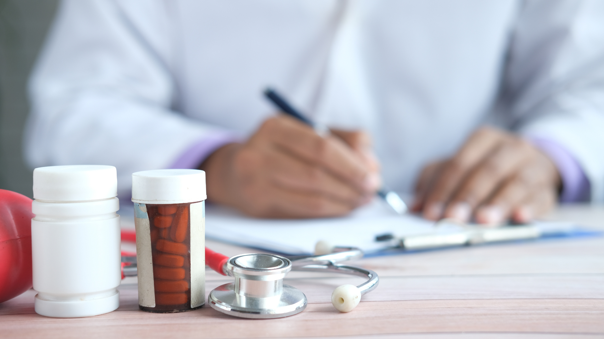 Human figure with chakra colors overlaid, surrounded by a colorful aura.