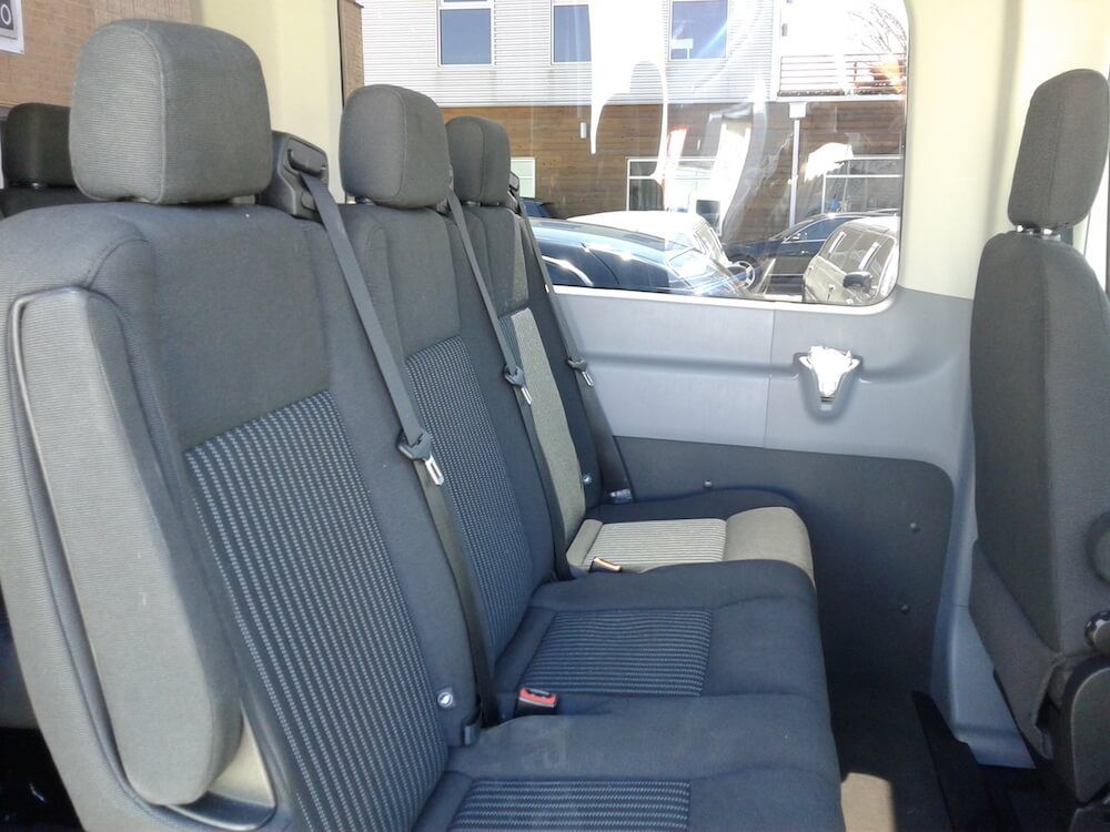 Pech Limo 8167563100 shuttle service in KC 14 Passenger Van