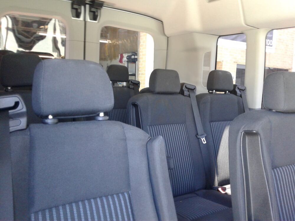 Pech Limo 8167563100 shuttle service in KC 14 Passenger Van