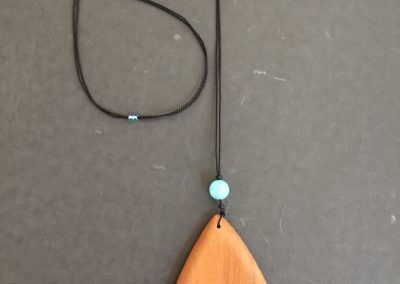 Olive triangle with large blue glass bead - Doylestown, PA - Hoehne Clark Fine Furniture & Design