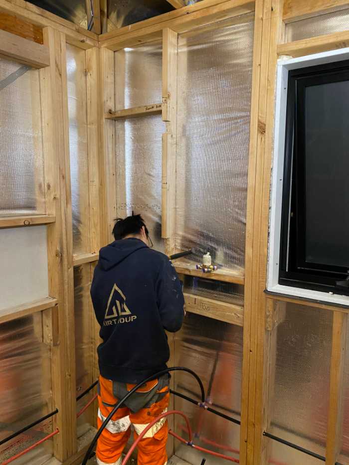 man installing fittings