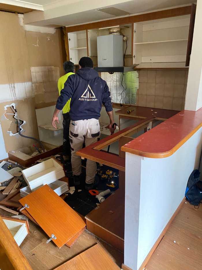 men working on renovation work