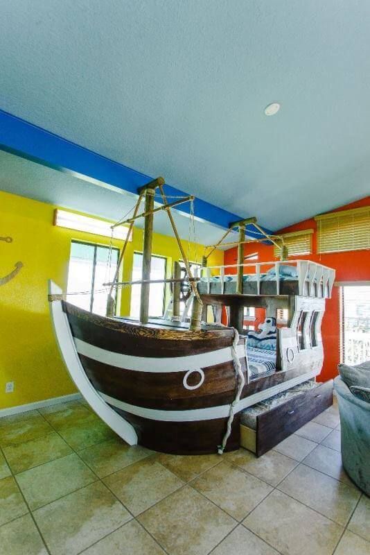 A bunk bed in the shape of a pirate ship