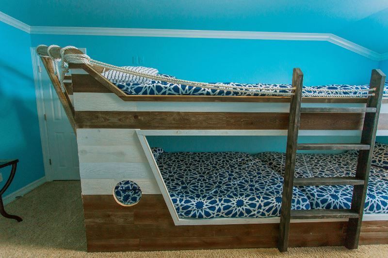 A bunk bed in the shape of a pirate ship