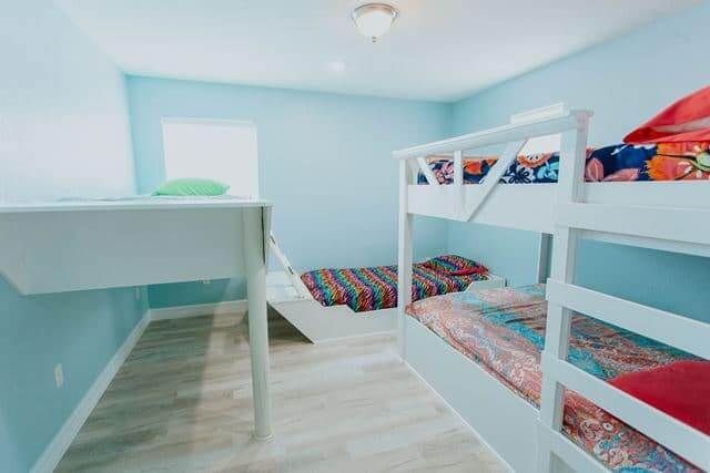 There are three bunk beds in the room.