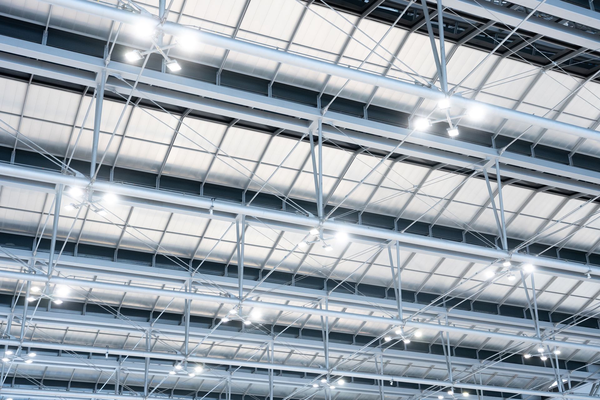 Ceiling with bright lights in a commercial space.