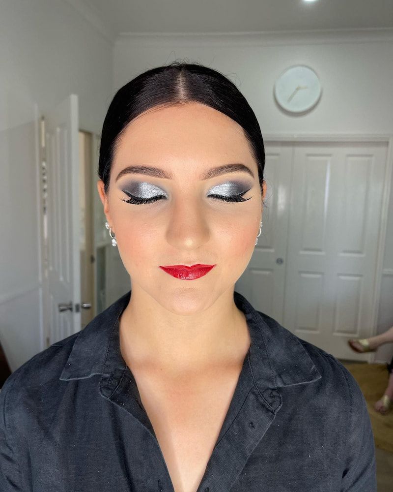 A Close Up of a Woman's Face With a Clock in the Background — Erikka's All Occasion Beauty In Rockhampton City, QLD