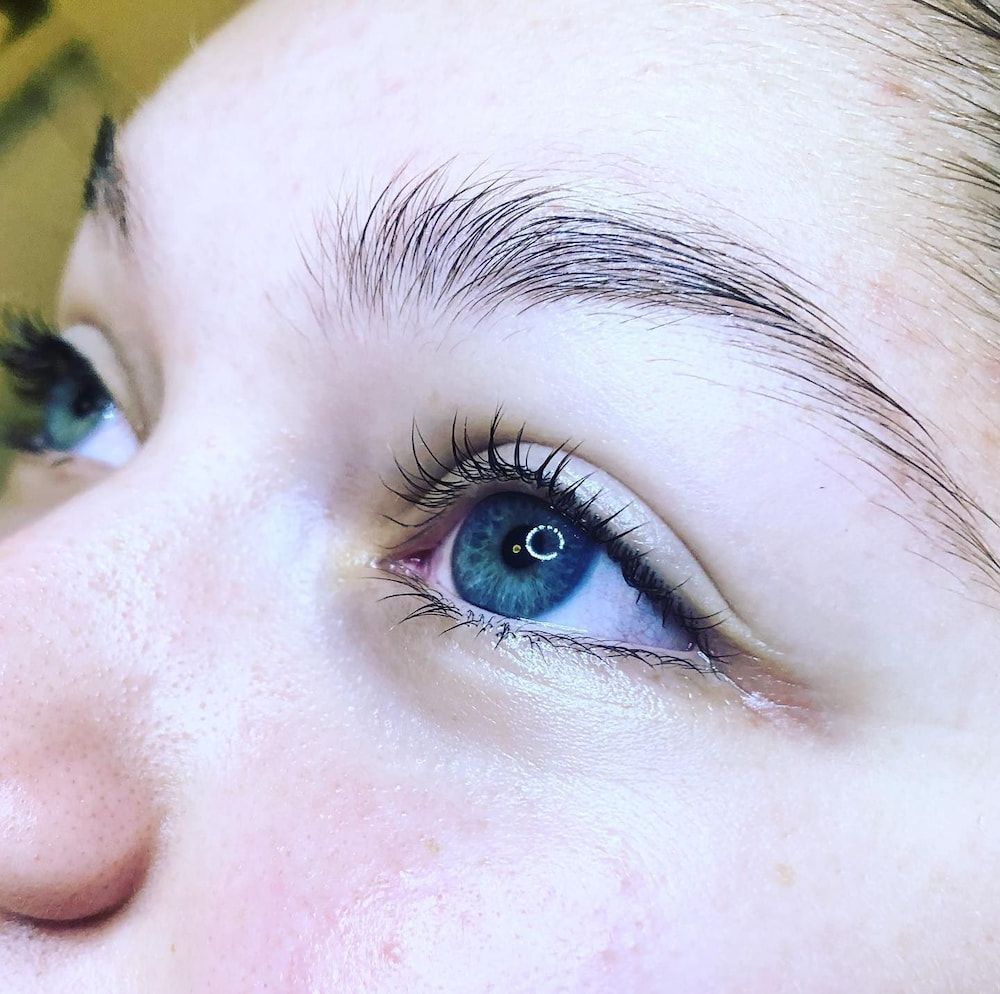 A Close Up of a Woman's Blue Eye With Long Eyelashes — Erikka's All Occasion Beauty In Rockhampton City, QLD