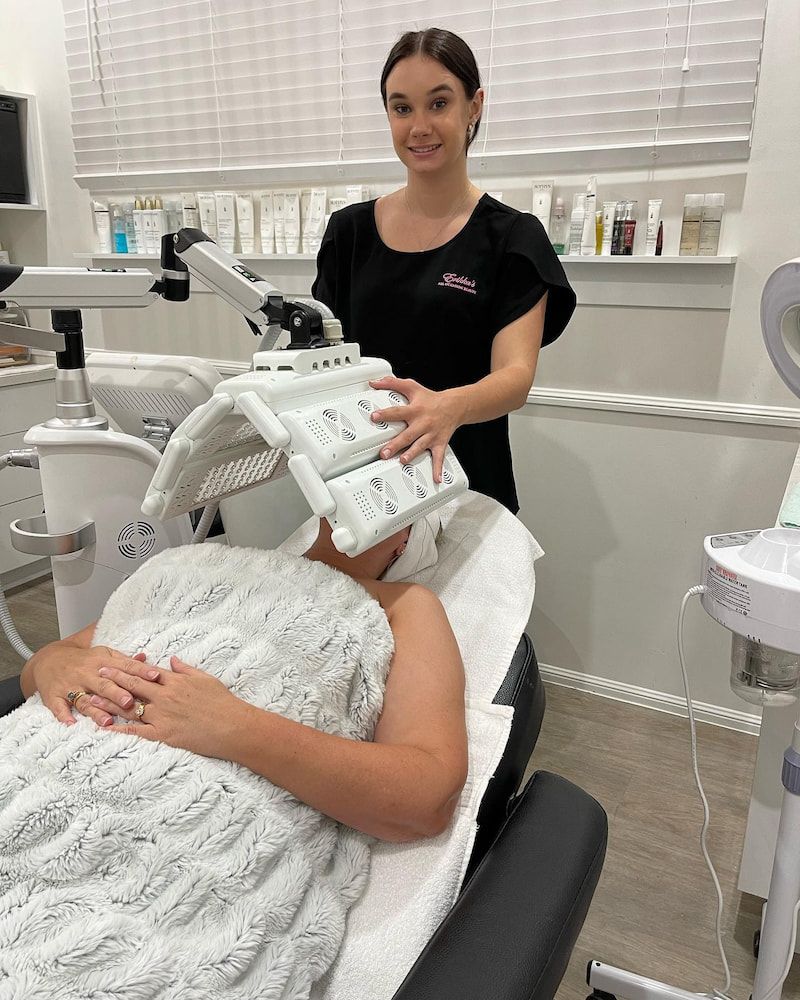 A Woman is Laying in a Chair Getting a Treatment at a Beauty Salon — Erikka's All Occasion Beauty In Rockhampton City, QLD