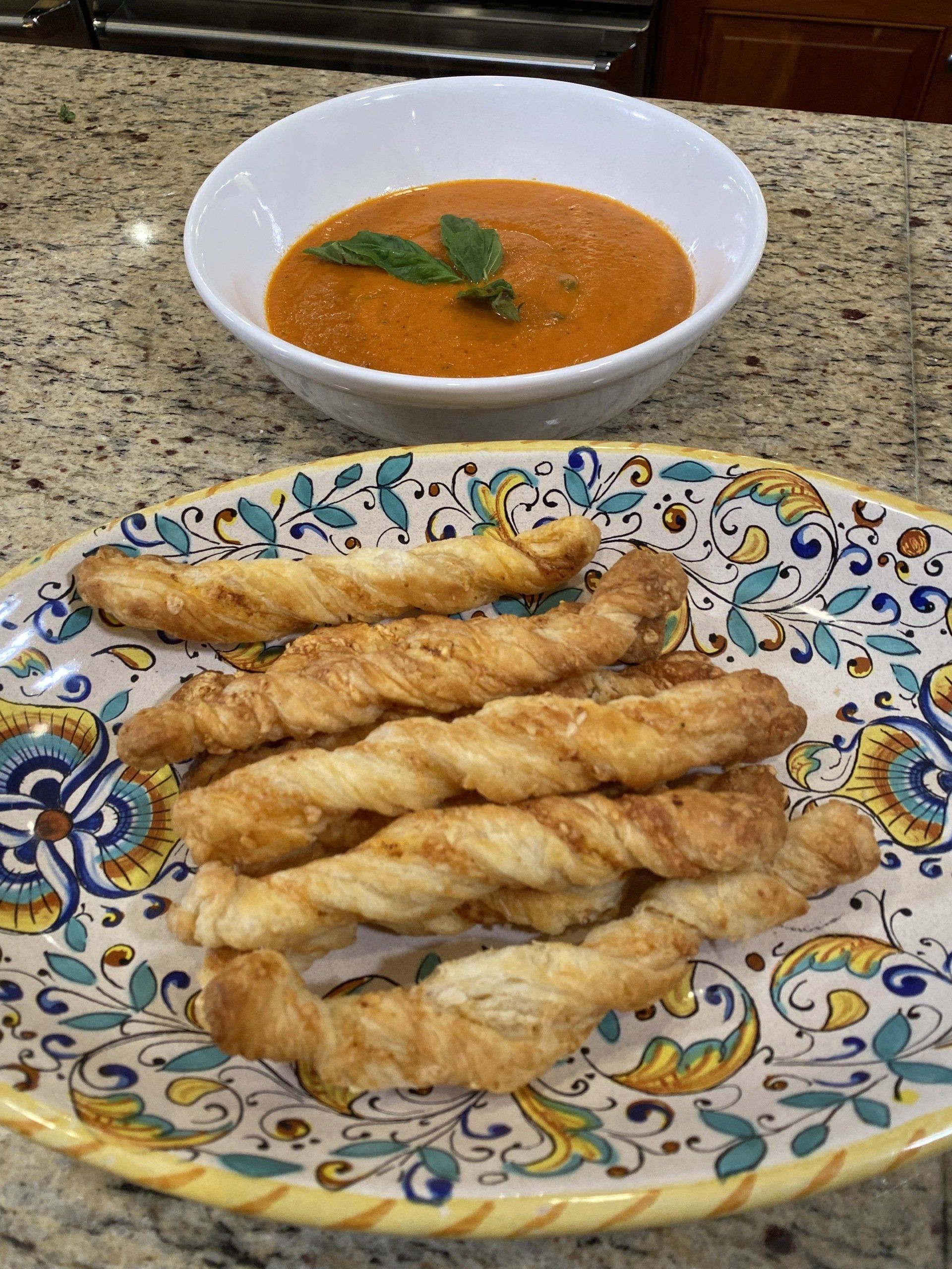 Tomato Bisque with Spicy Cheddar Twists