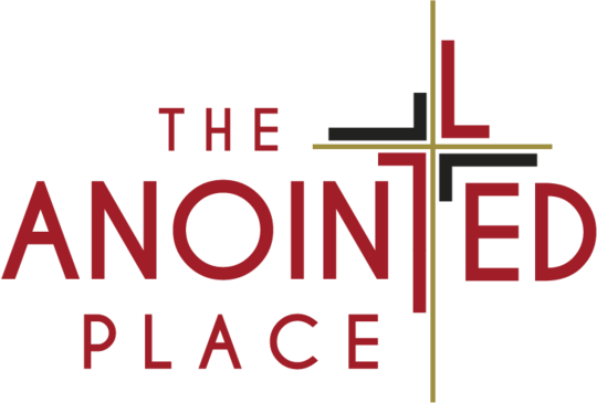 The logo for the anointed place has a cross on it.
