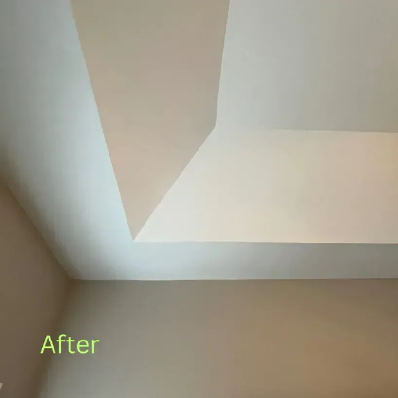 A picture of a ceiling after being painted white.