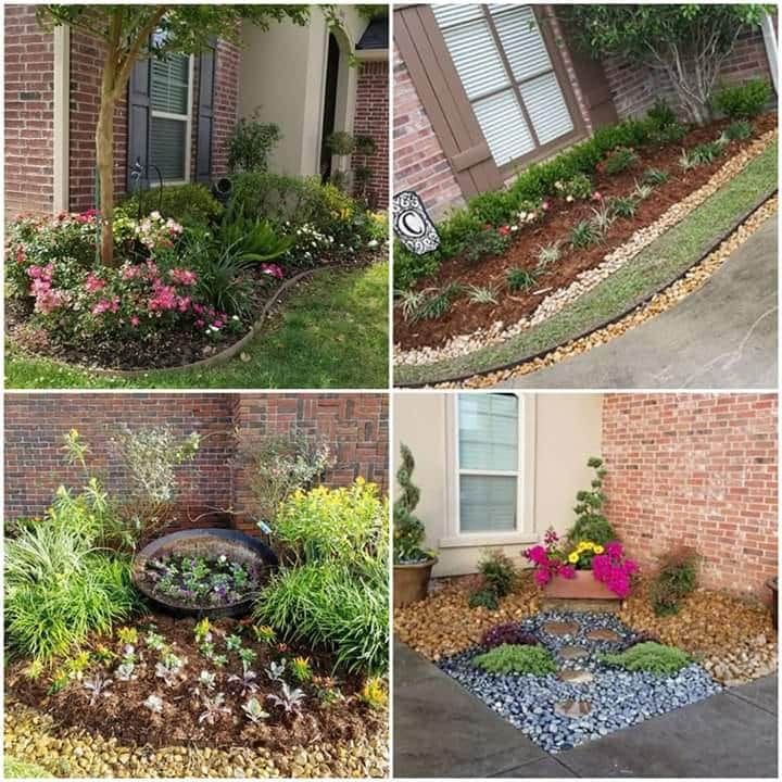 Landscaped flower beds with various plants, mulch, and rocks bordering a brick house.