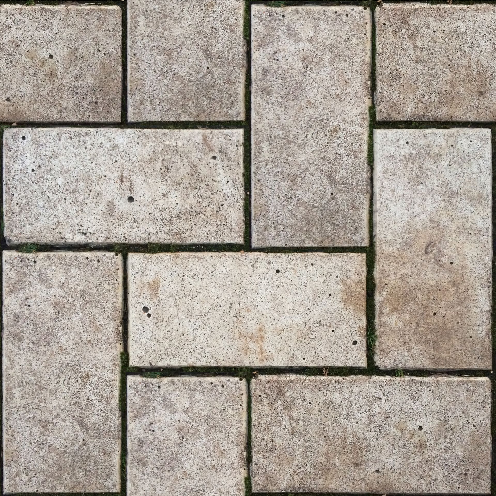 A close-up of a brick floor with a diagonal pattern