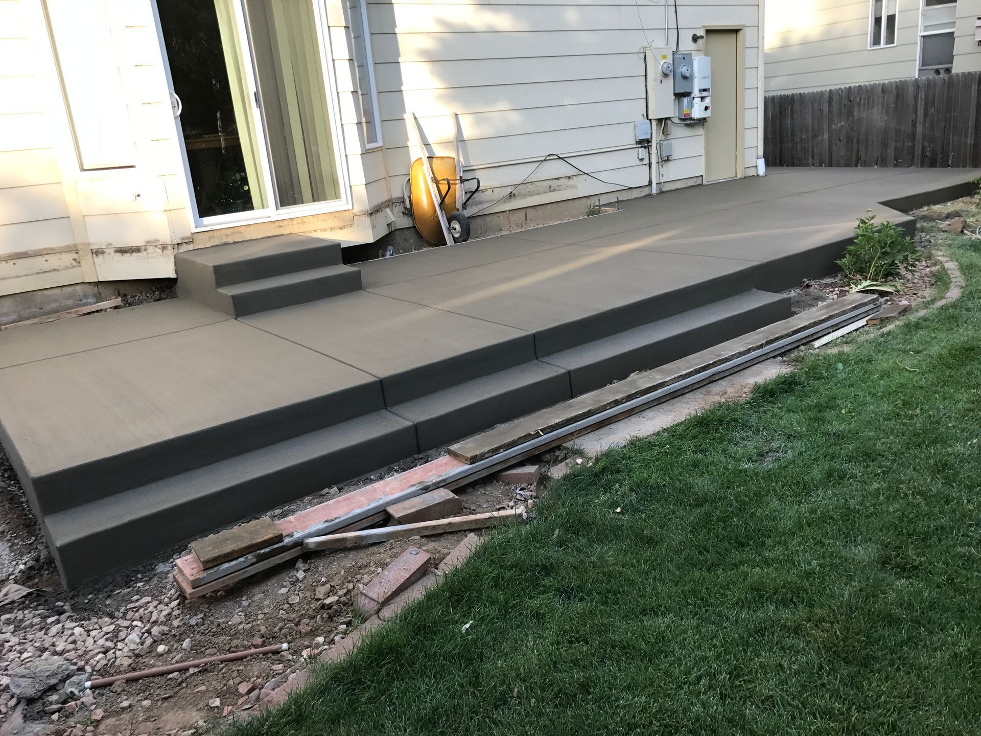 A set of concrete stairs with a diagonal pattern