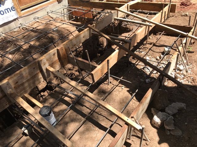 A construction site with a sign that says welcome home