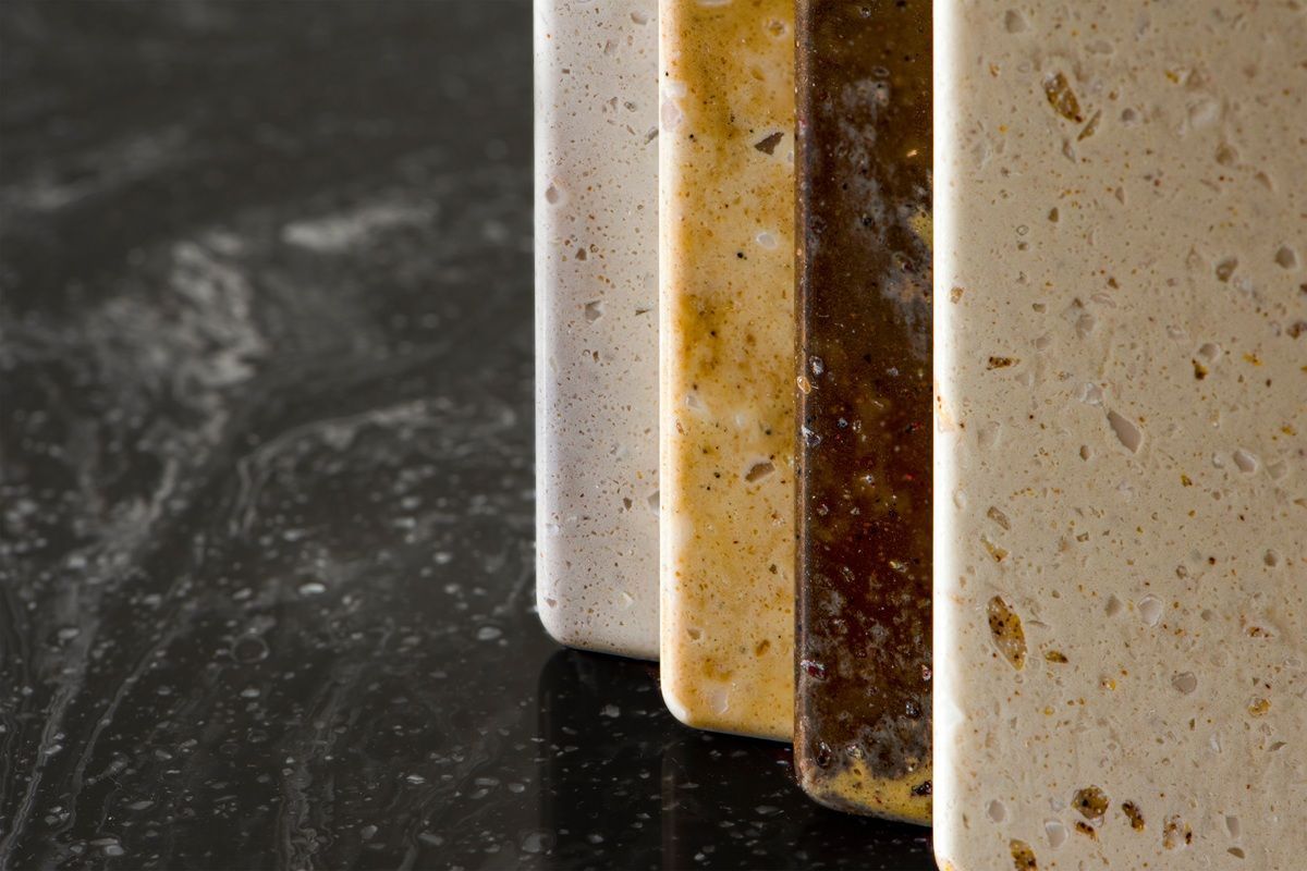 Close-up of a marble surface with brown, beige, and white veining.