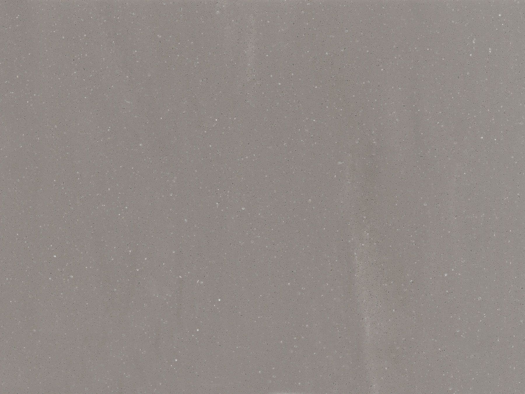 Gray, speckled, textured surface with subtle variations in tone.