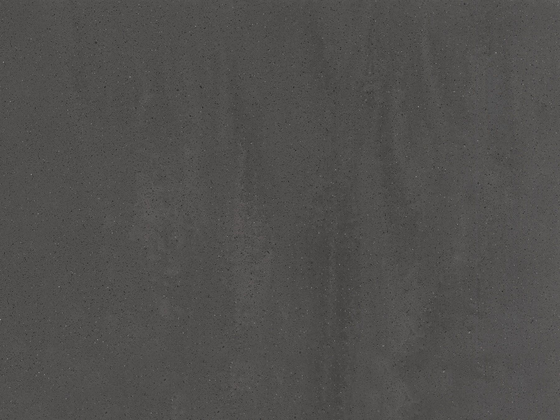 Gray speckled stone surface.