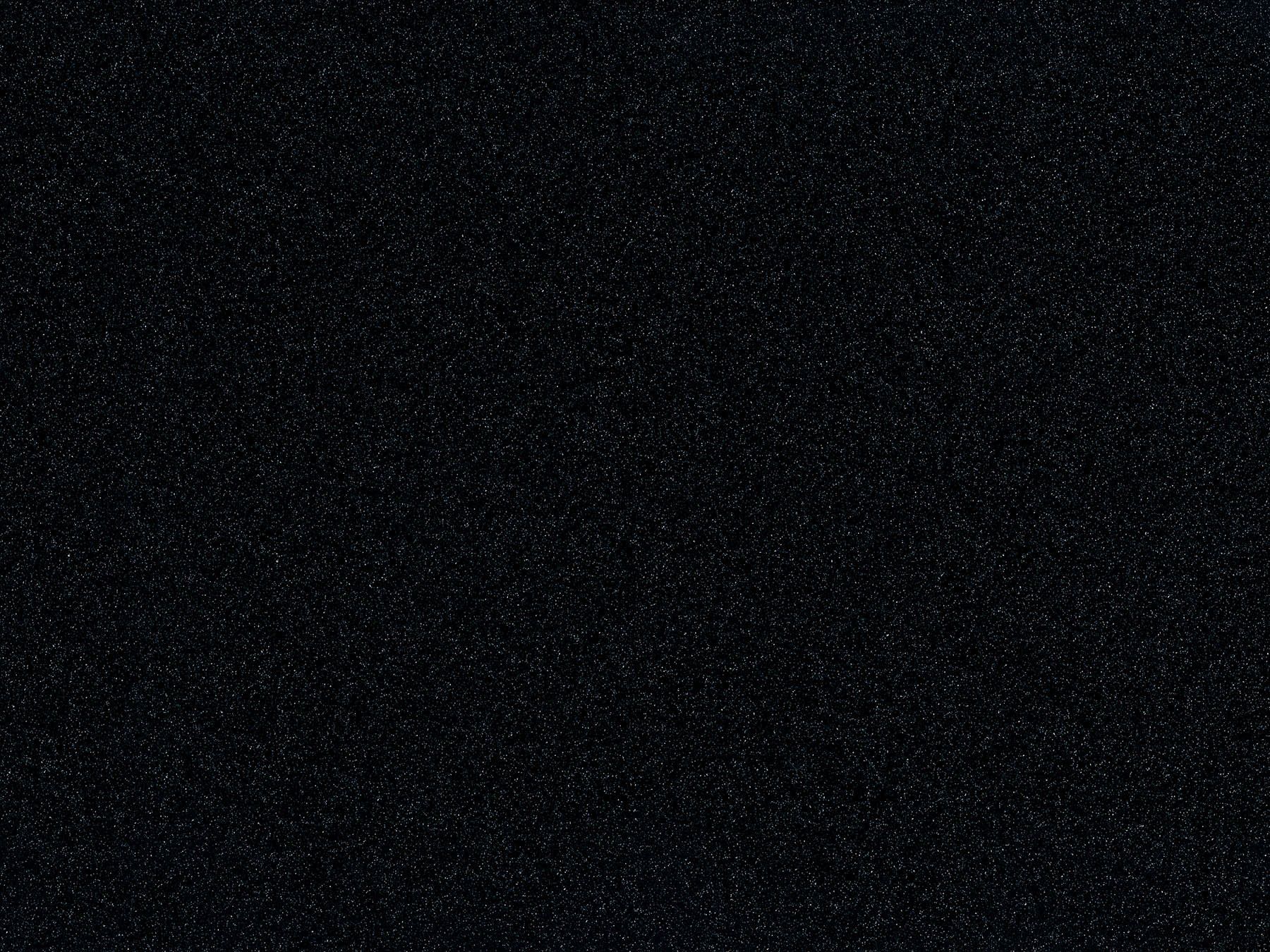 Black, speckled texture.