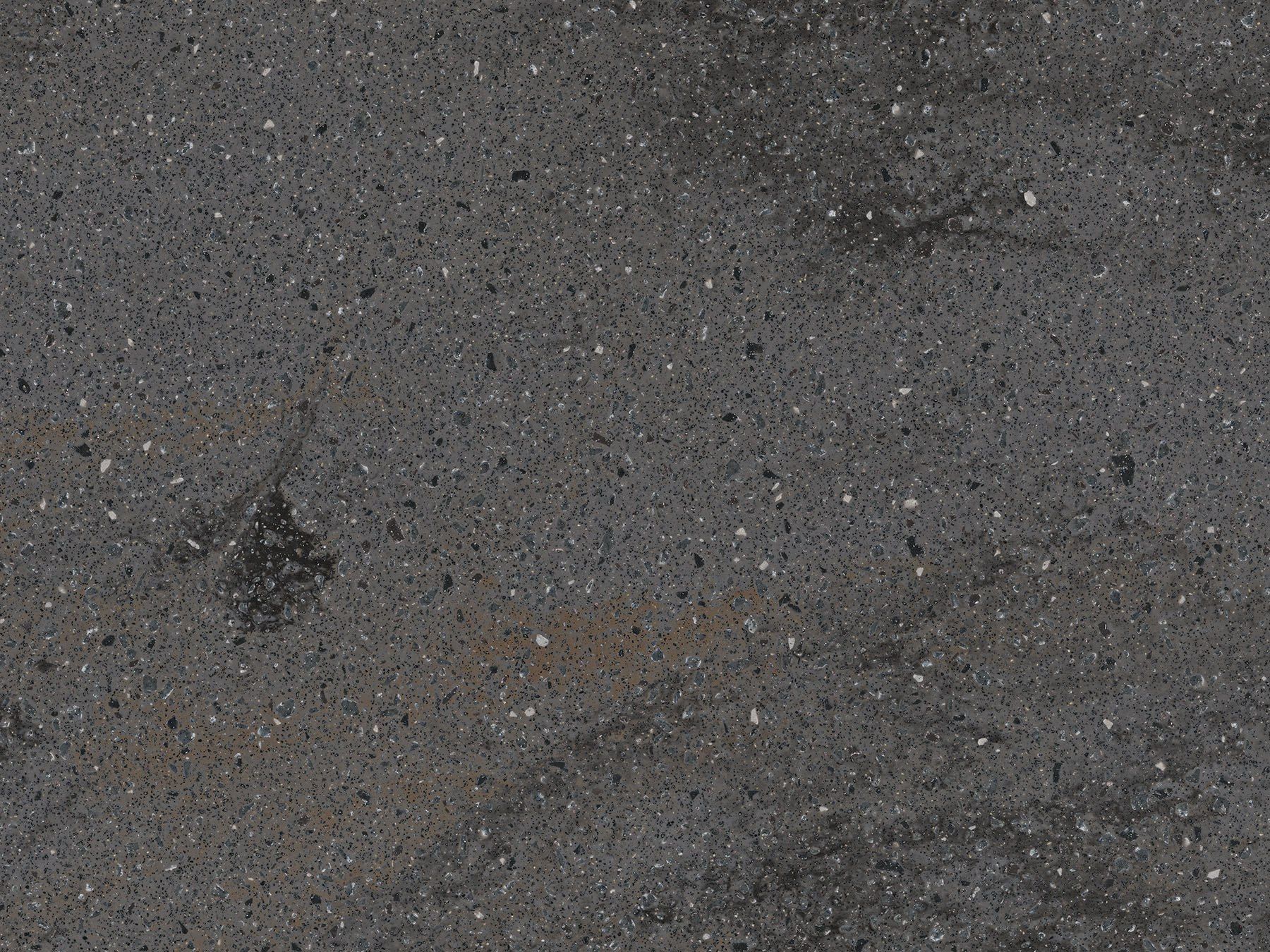 Dark gray asphalt pavement with small flecks.