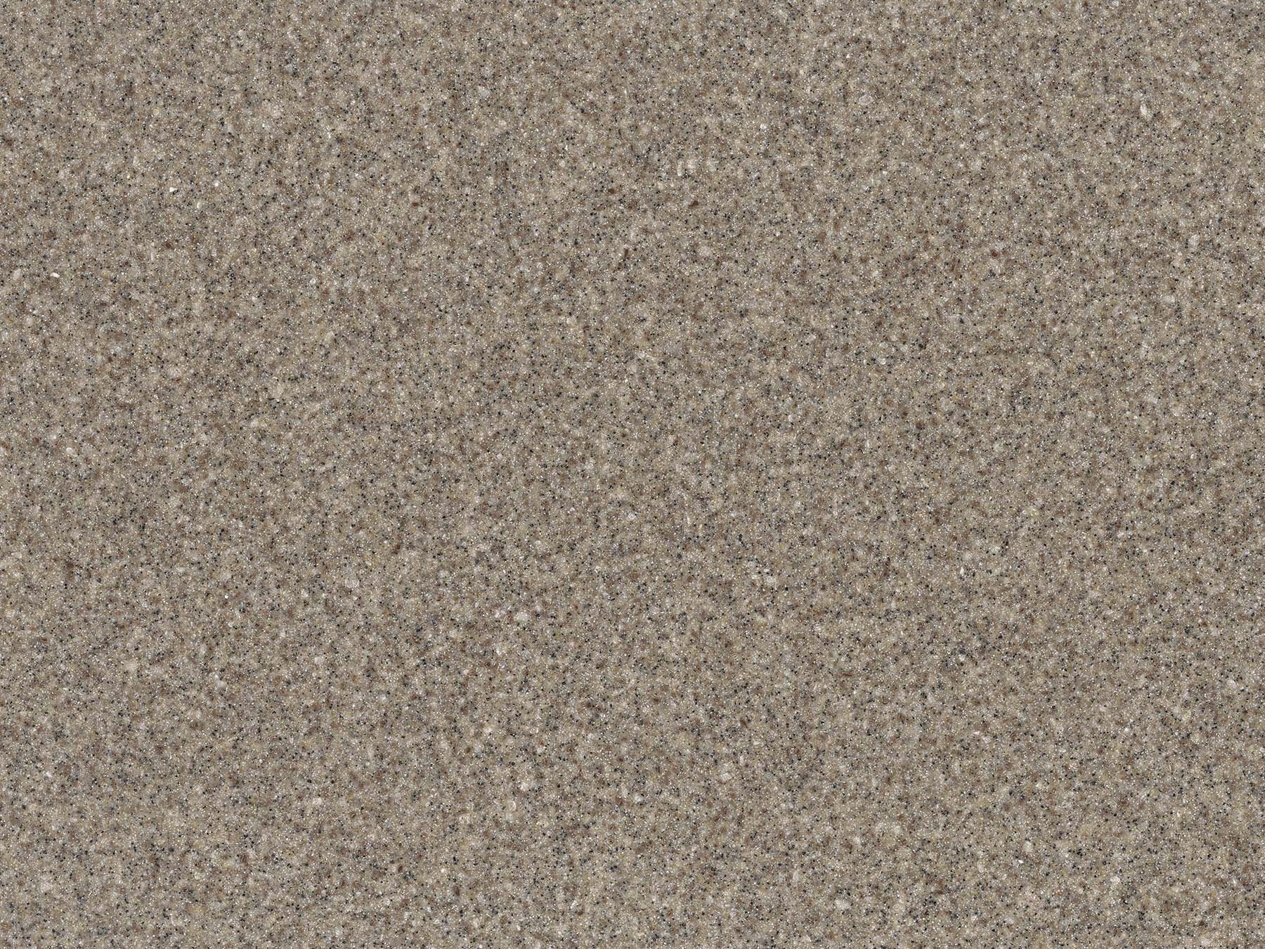 Gray, textured surface resembling coarse sand or aggregate.